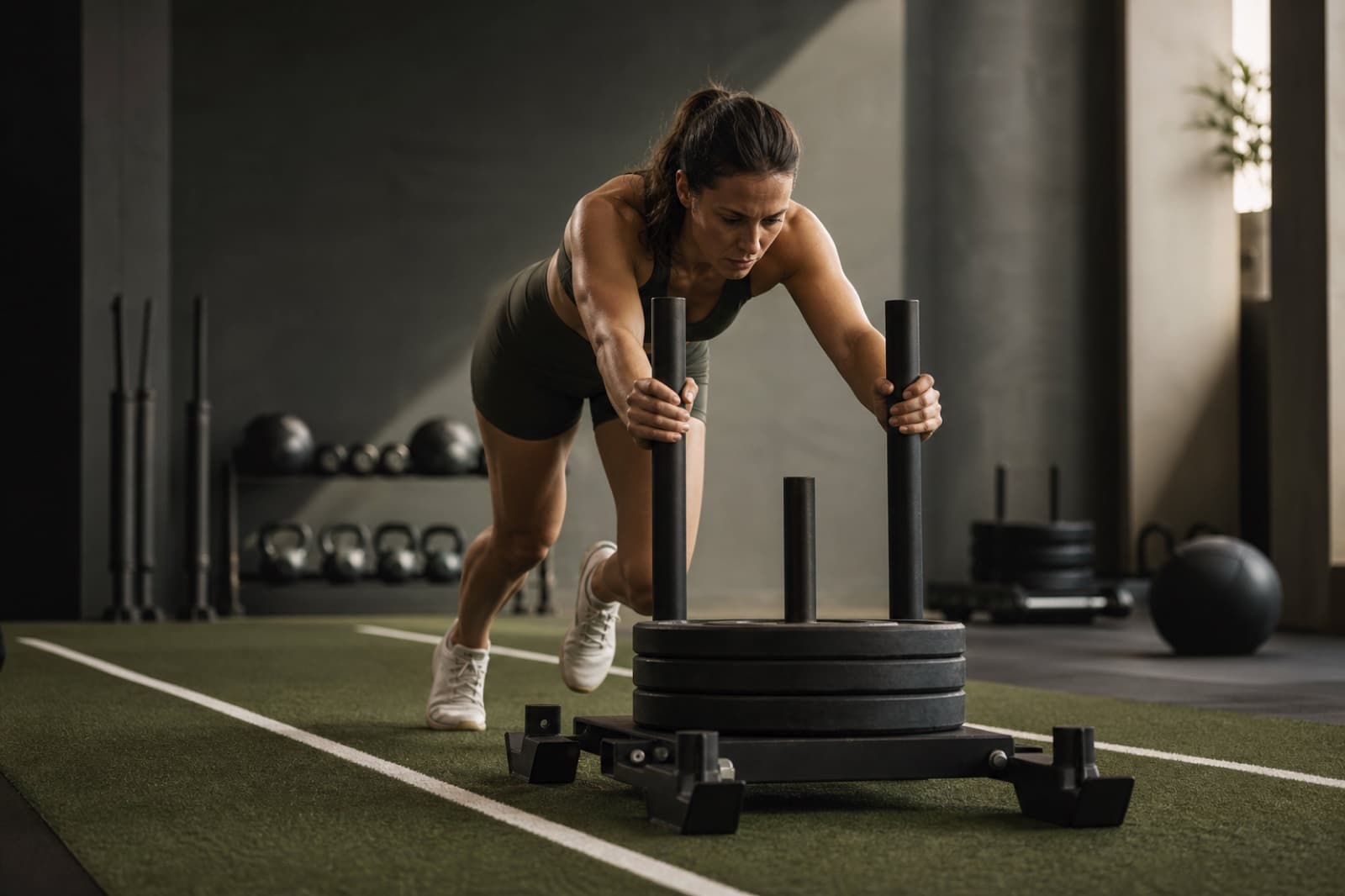 A hybrid athlete transitioning between a strength session and an outdoor run